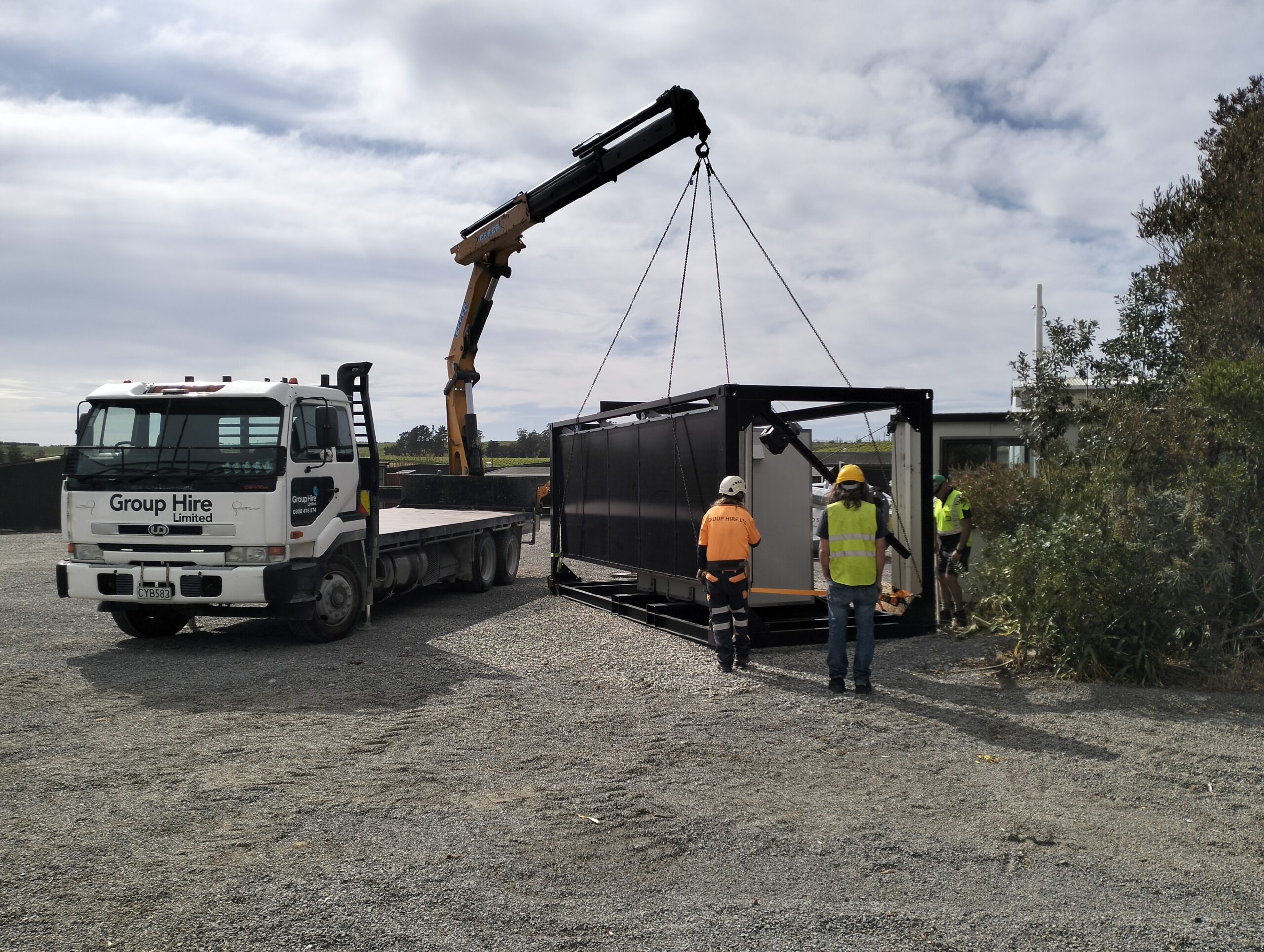 PowerCrate being placed on site by a HIAB